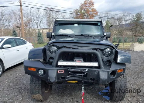 2014 Jeep Wrangler Unlimited Sahara from USA, damaged, VIN 1C4BJWEGXEL110669